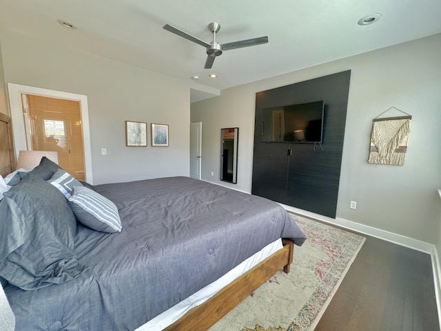 bedroom featuring hardwood / wood-style flooring and ceiling fan