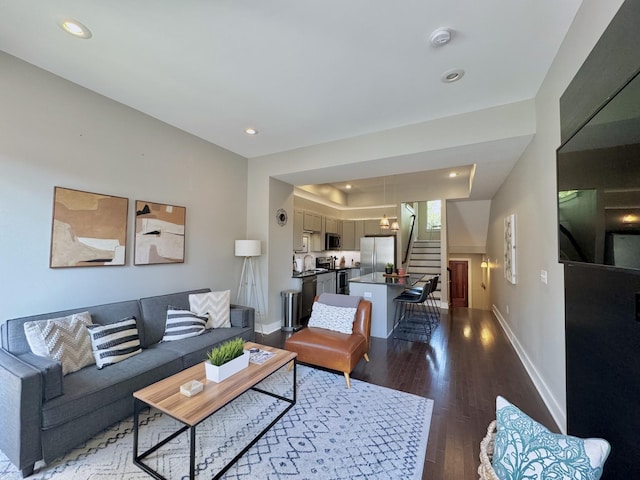 living room with wood-type flooring