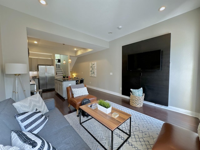 living room with dark wood-type flooring