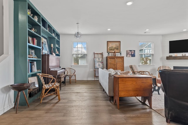 sitting room with hardwood / wood-style floors