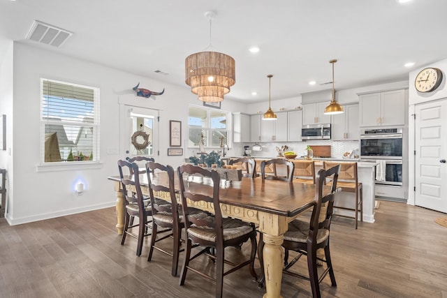 dining room featuring dark hardwood / wood-style floors