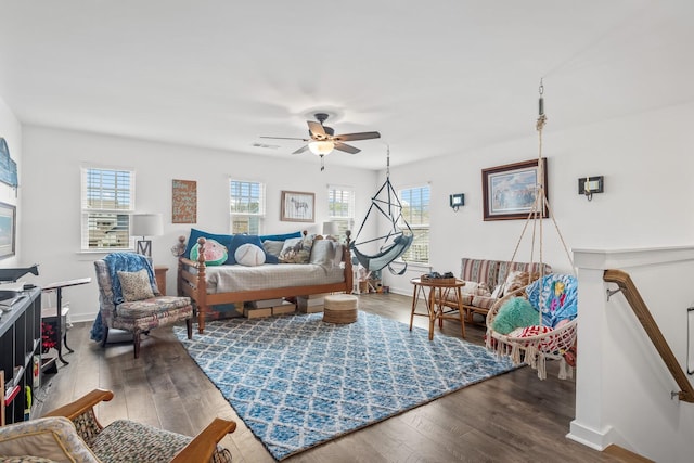 living room with ceiling fan and hardwood / wood-style flooring