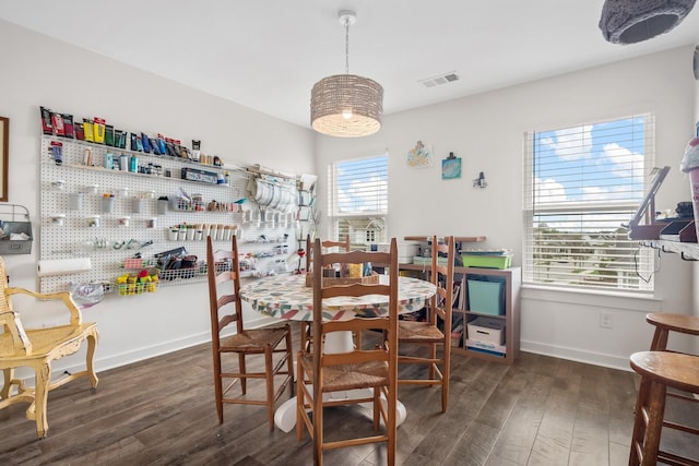 dining room featuring dark hardwood / wood-style flooring