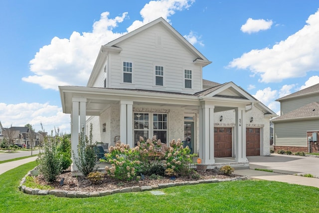 view of front facade with a front lawn and a garage