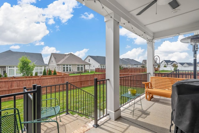 balcony with grilling area and ceiling fan