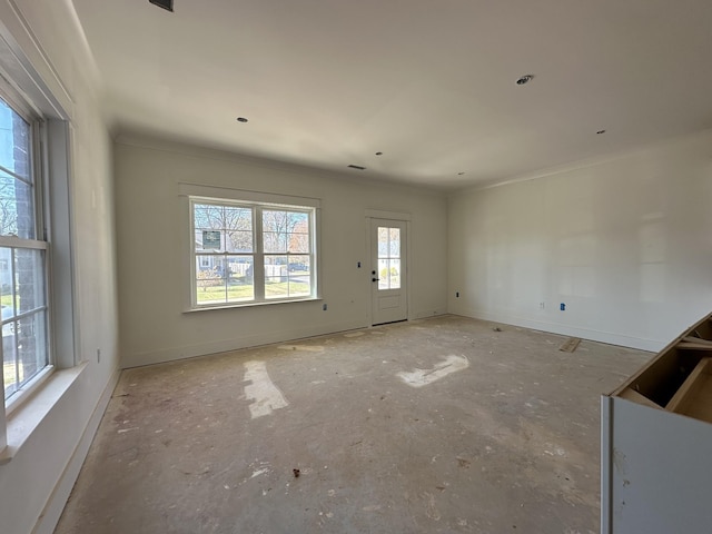 interior space with crown molding