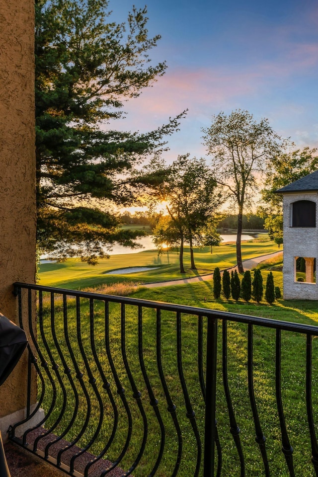 view of balcony at dusk