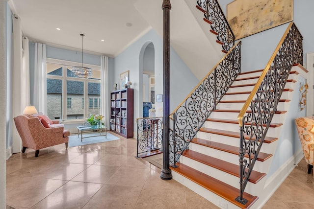 stairway featuring tile patterned flooring