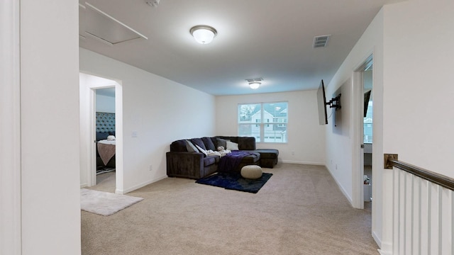 sitting room with light colored carpet