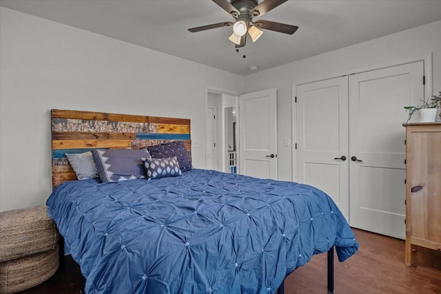 bedroom with ceiling fan, a closet, and hardwood / wood-style flooring