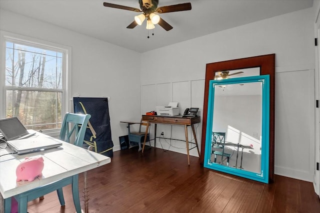 office space featuring ceiling fan and dark hardwood / wood-style floors