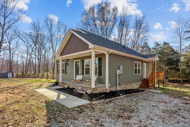 view of front of property featuring covered porch