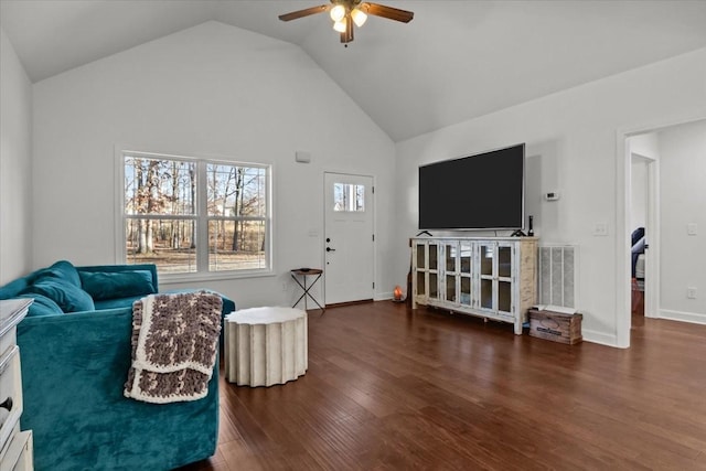 sitting room featuring ceiling fan, high vaulted ceiling, and dark wood-type flooring