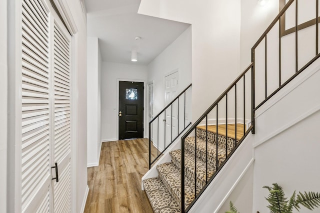 foyer with light hardwood / wood-style floors