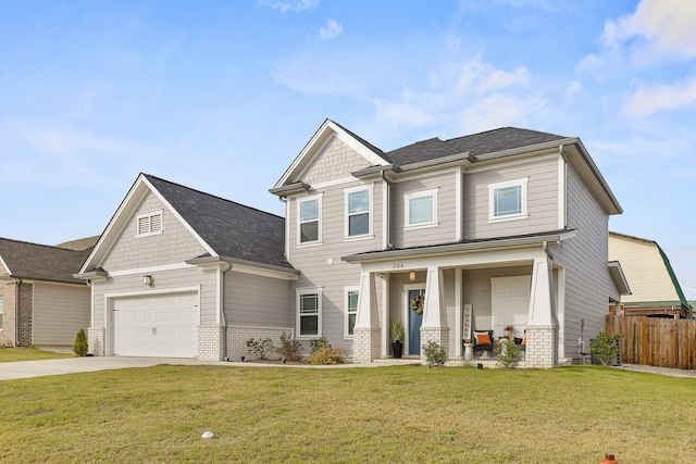 craftsman-style home with a front yard, a porch, and a garage