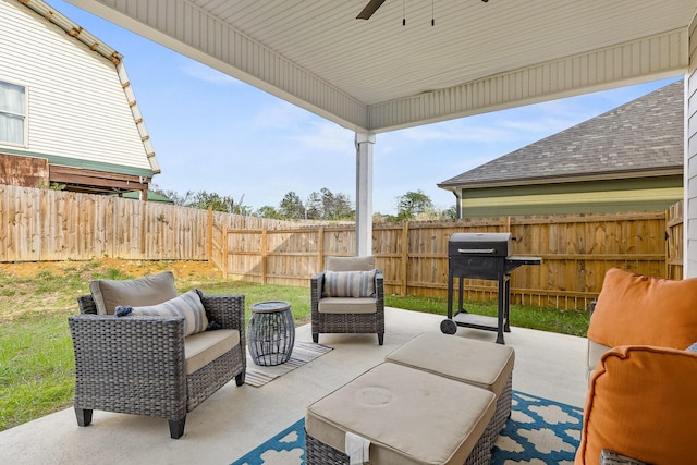 view of patio with outdoor lounge area, ceiling fan, and area for grilling