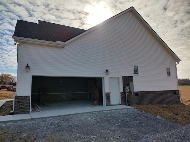 view of home's exterior with a garage