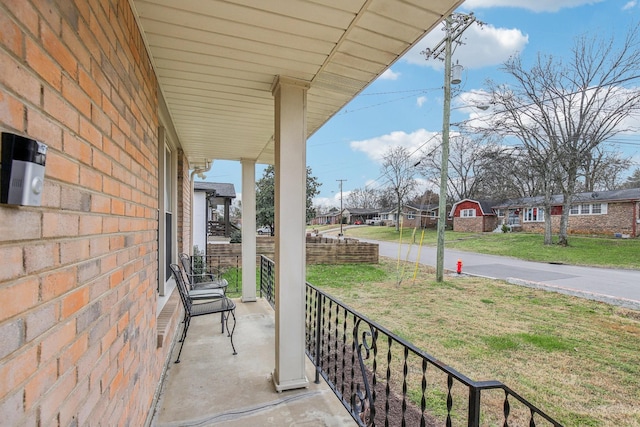 view of patio featuring a porch