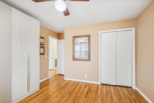 unfurnished bedroom with light hardwood / wood-style floors and ceiling fan