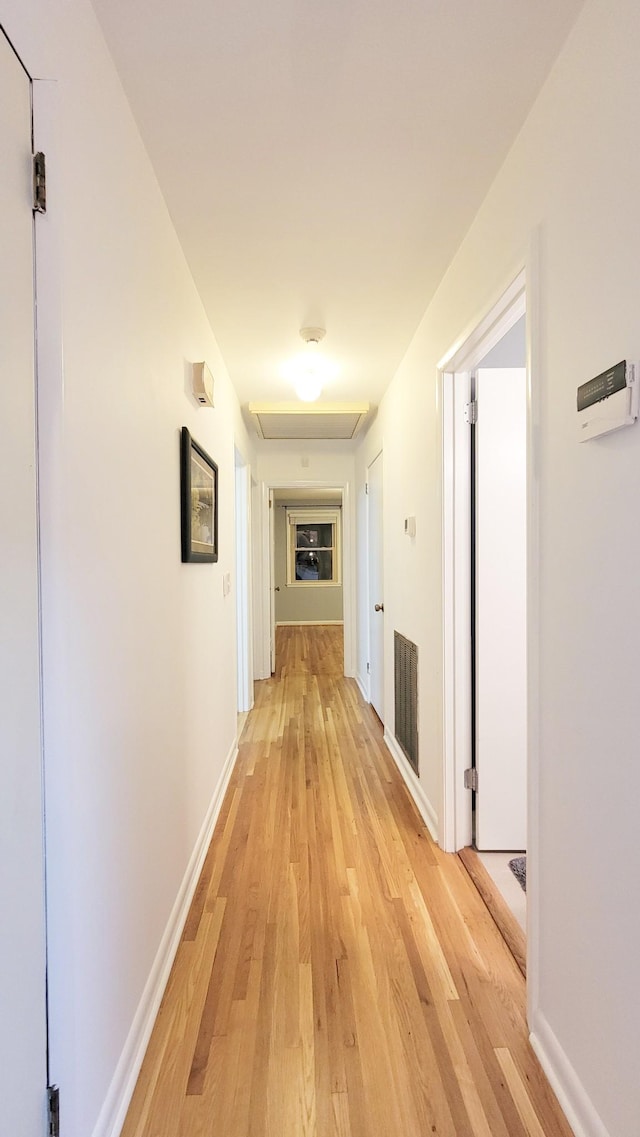 corridor featuring light wood-type flooring