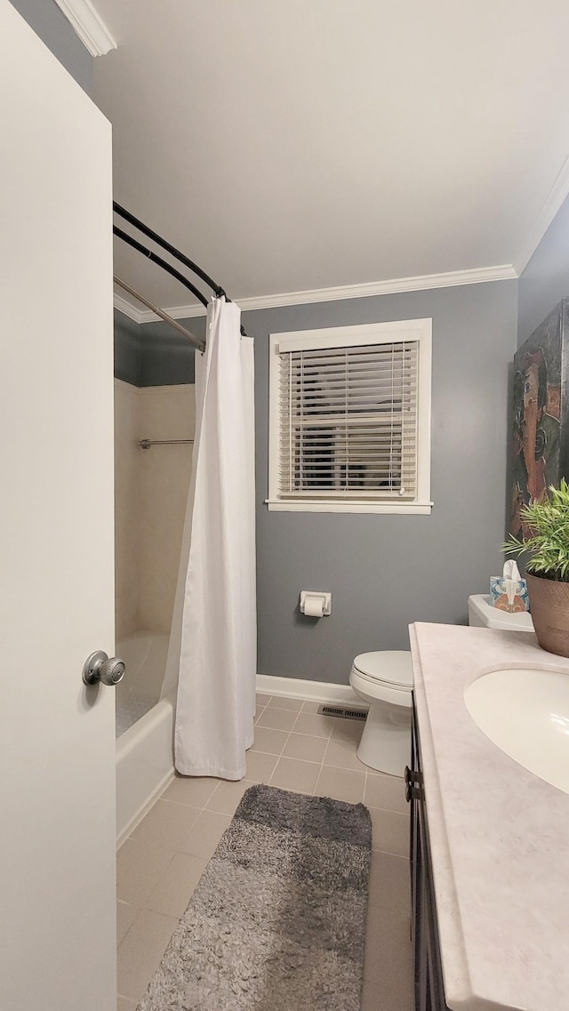 full bathroom with vanity, tile patterned floors, crown molding, toilet, and shower / tub combo