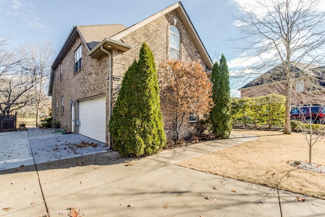 view of property exterior featuring a garage