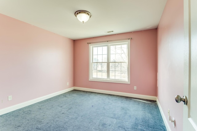 spare room featuring carpet flooring