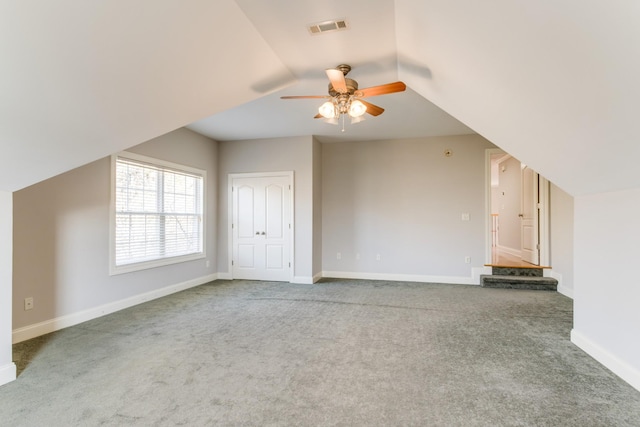 bonus room with carpet, vaulted ceiling, and ceiling fan