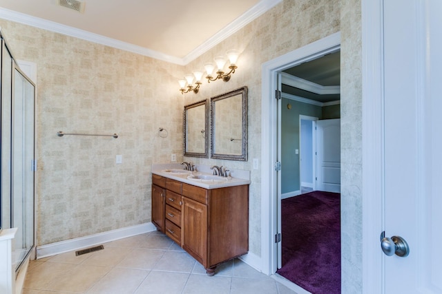 bathroom featuring tile patterned flooring, vanity, and ornamental molding