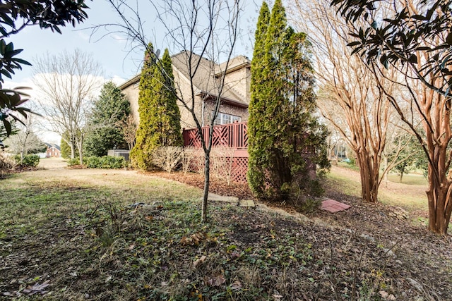 view of yard featuring a deck