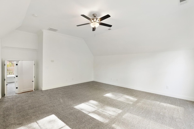 bonus room with ceiling fan, carpet floors, and vaulted ceiling