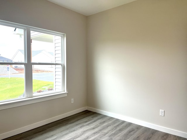 spare room featuring light hardwood / wood-style flooring