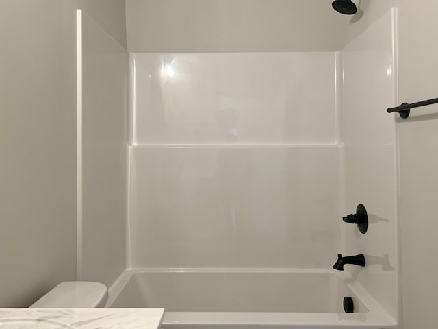 bathroom with  shower combination and toilet