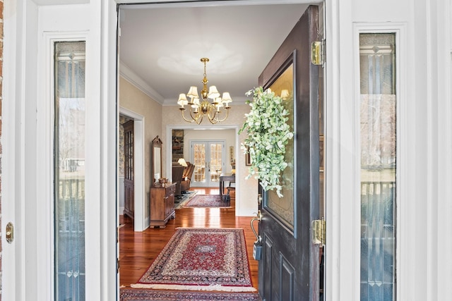 255 Parks Dr, Normandy, TN 37360 - entryway featuring dark wood-style floors, a chandelier, ornamental molding, and french doors