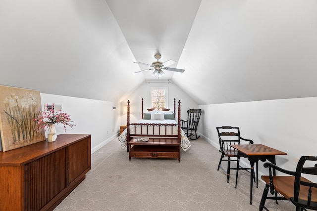 carpeted bedroom featuring vaulted ceiling