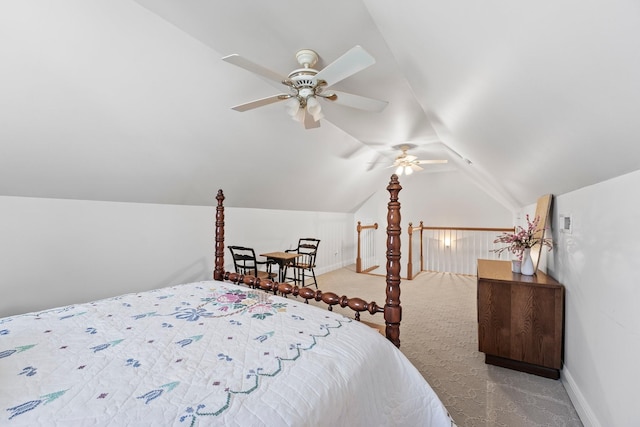 carpeted bedroom with vaulted ceiling and ceiling fan