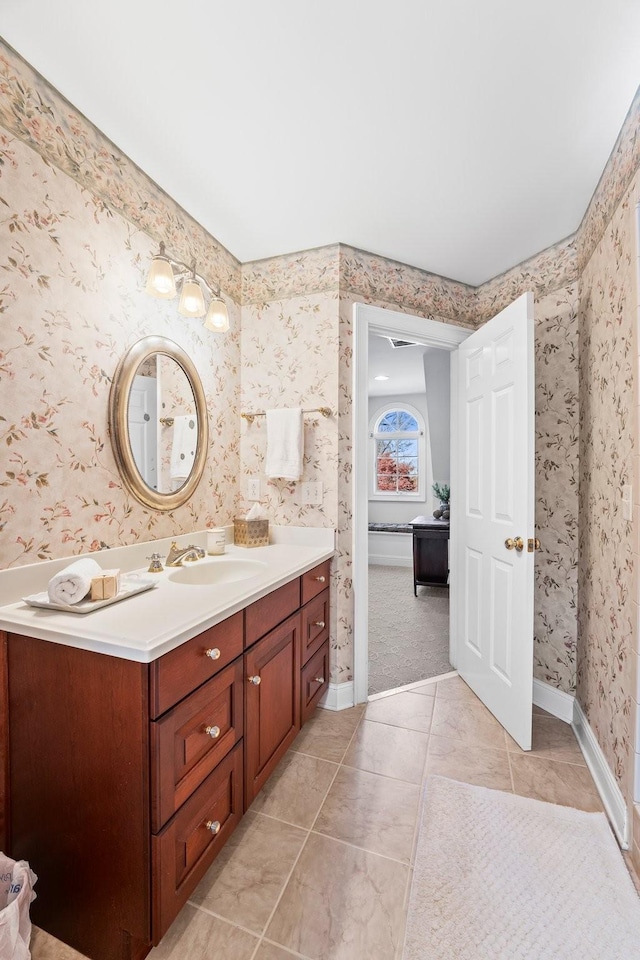 255 Parks Dr, Normandy, TN 37360 - bathroom with wallpapered walls, vanity, and tile patterned floors
