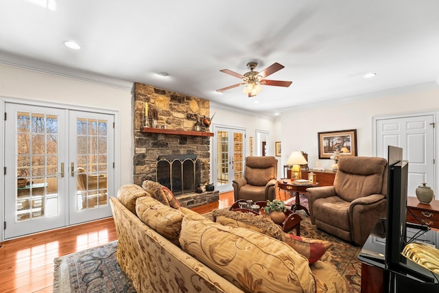 255 Parks Dr, Normandy, TN 37360 - living room with french doors, ornamental molding, wood finished floors, a ceiling fan, and a fireplace
