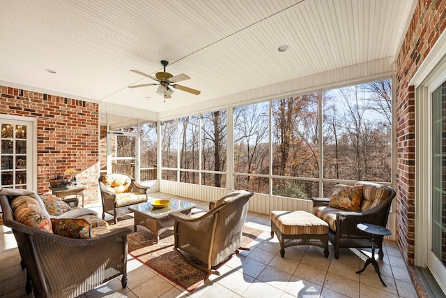 sunroom / solarium with ceiling fan and plenty of natural light