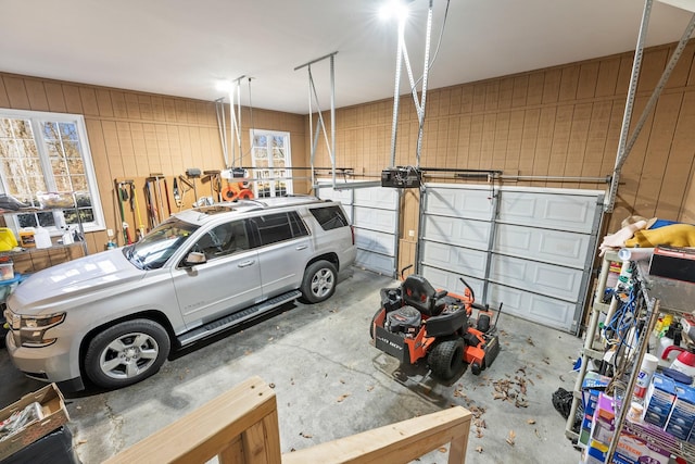 garage featuring wooden walls