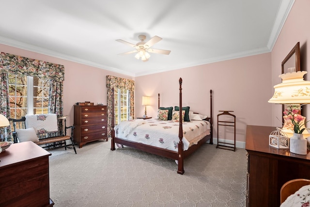 bedroom with carpet flooring, ceiling fan, and crown molding