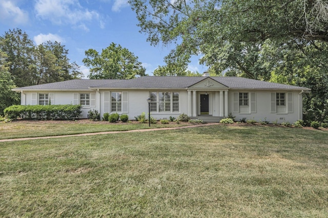 single story home with a front yard