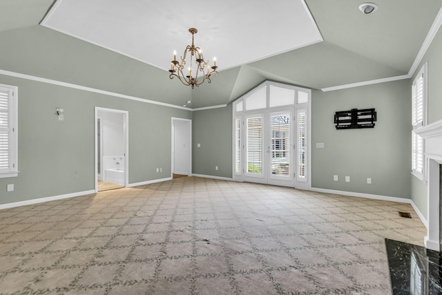 interior space with light colored carpet, vaulted ceiling, a wealth of natural light, and ornamental molding