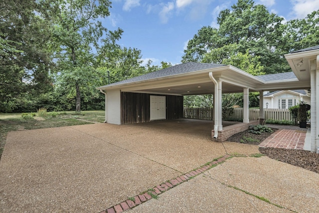 view of parking / parking lot with a carport