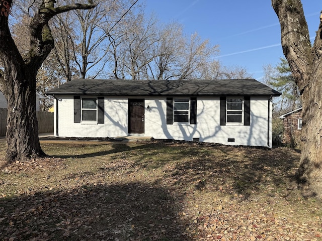 single story home featuring a front yard