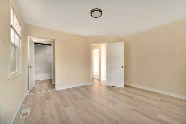 unfurnished bedroom featuring light hardwood / wood-style floors