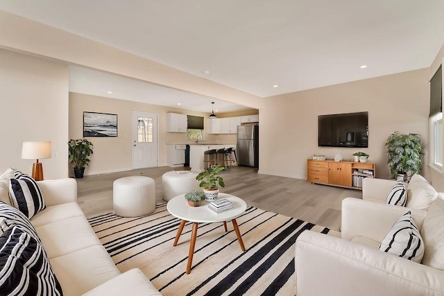 living room featuring light hardwood / wood-style flooring