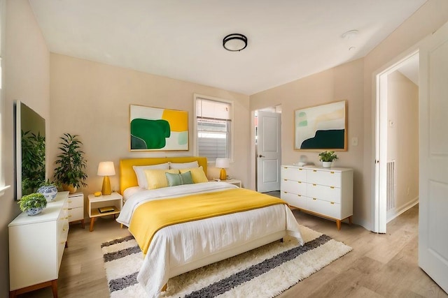 bedroom featuring light wood-type flooring