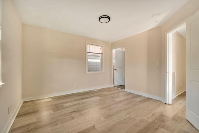 empty room featuring light hardwood / wood-style floors