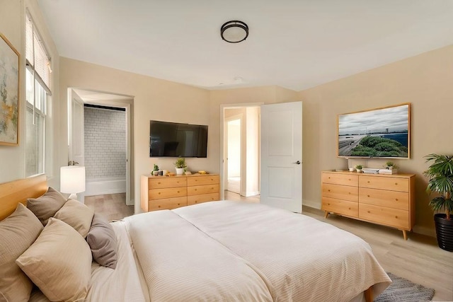 bedroom with light wood-type flooring